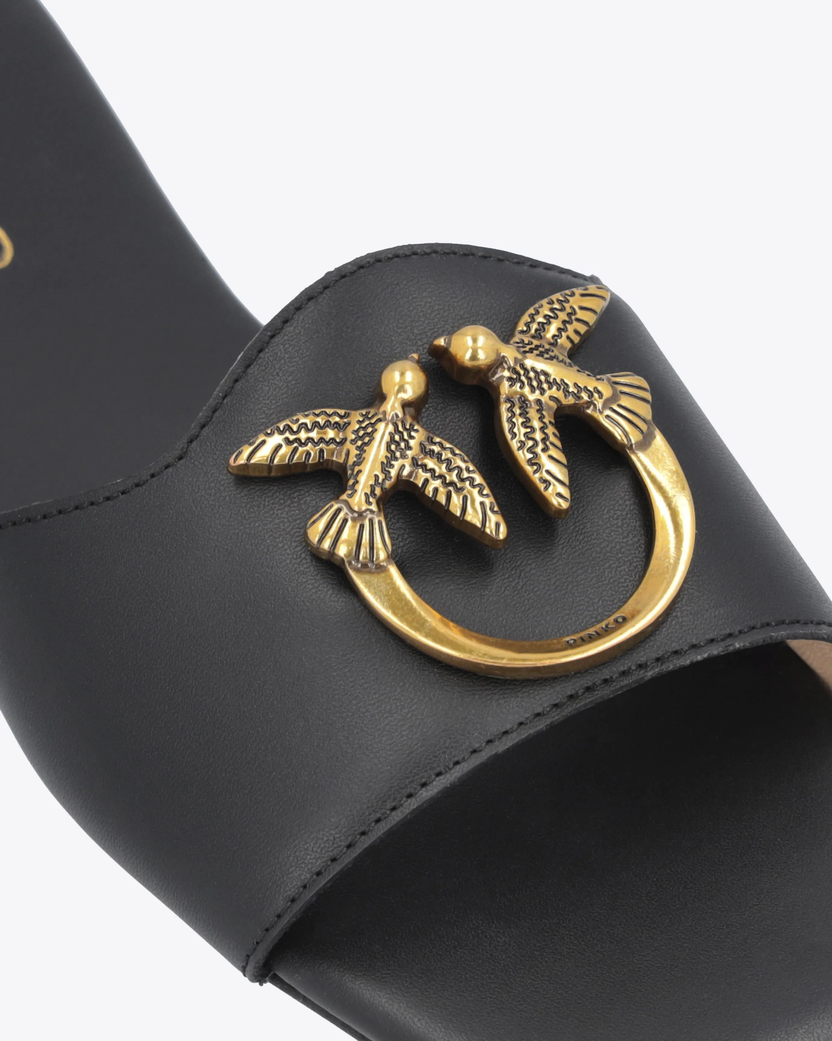 Ciabattina nera in pelle con Love Birds dorato sulla fascetta