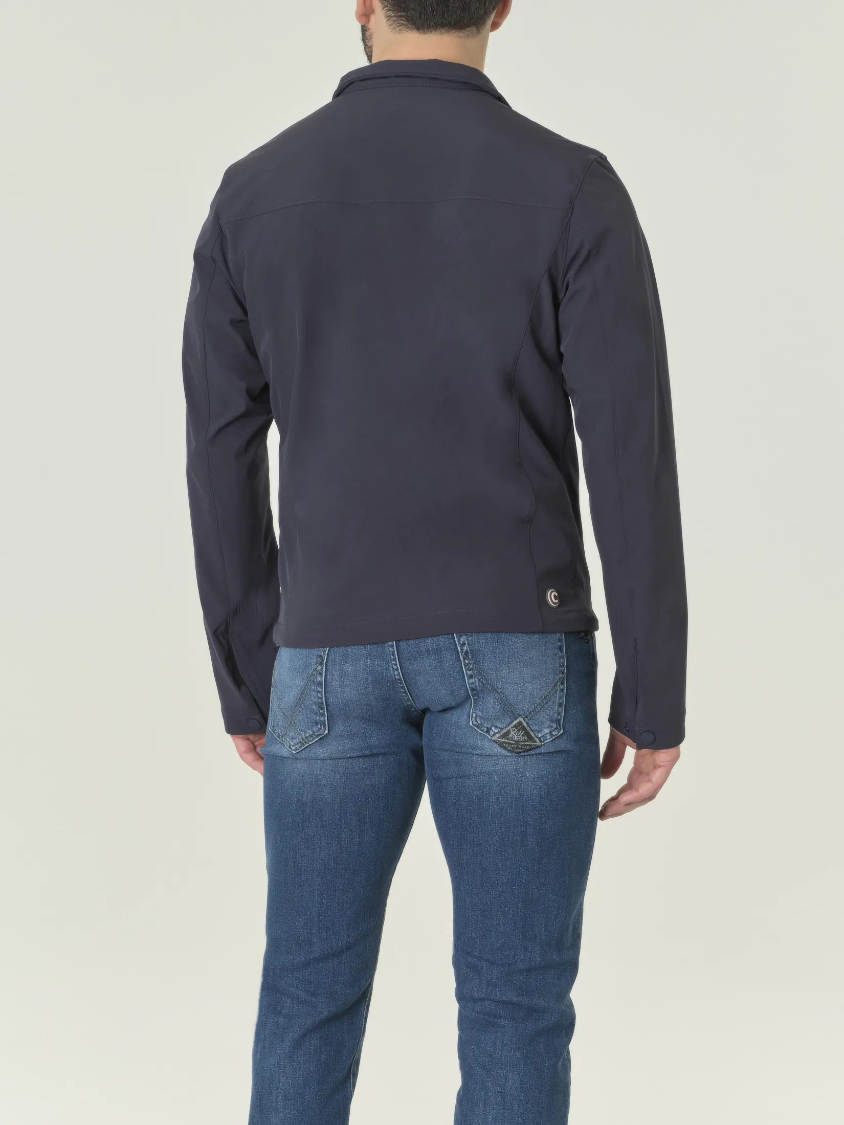 Giubbino blu in softshell stretch con chiusura a cerniera
