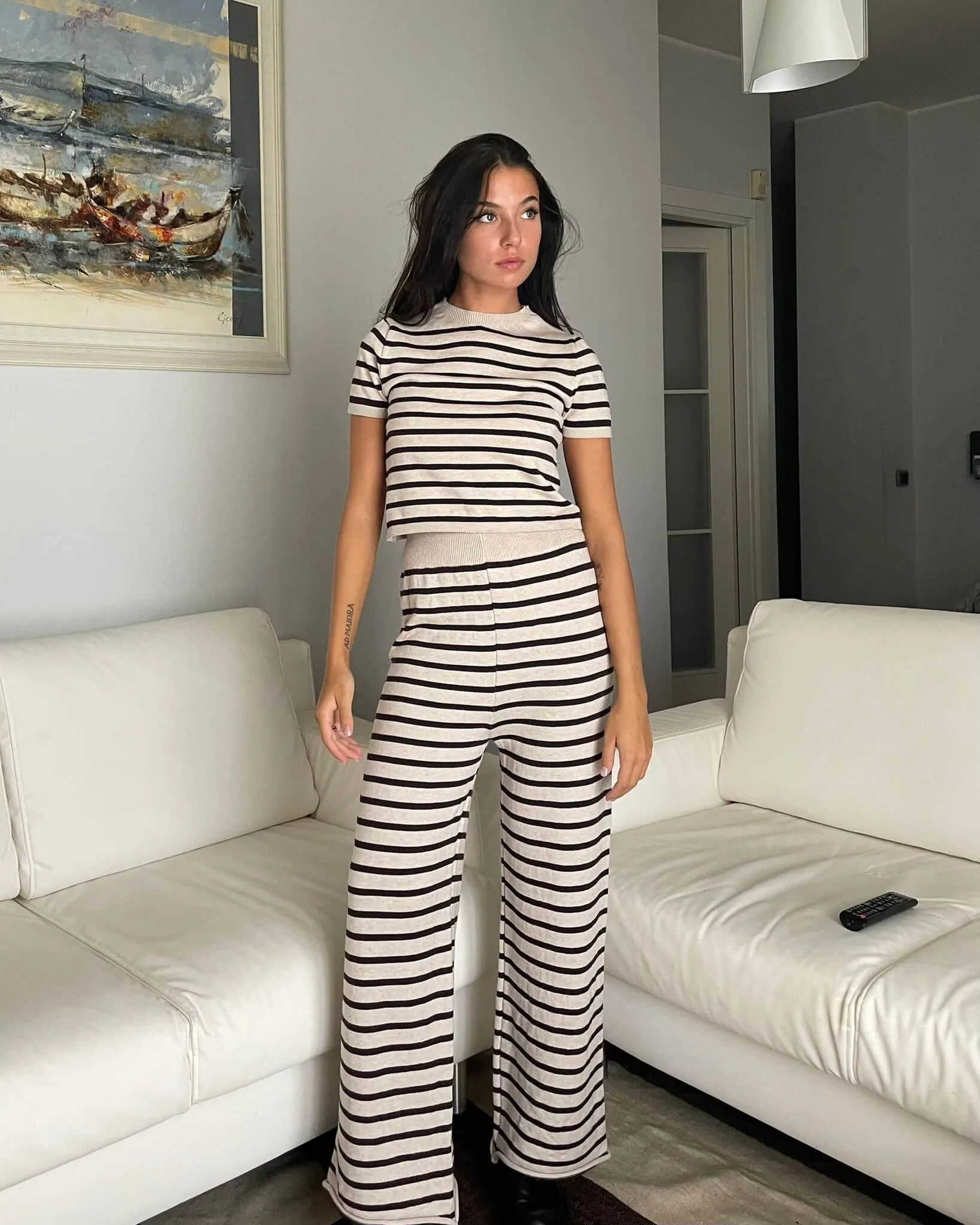 Pantaloni in maglia a righe beige e marroni