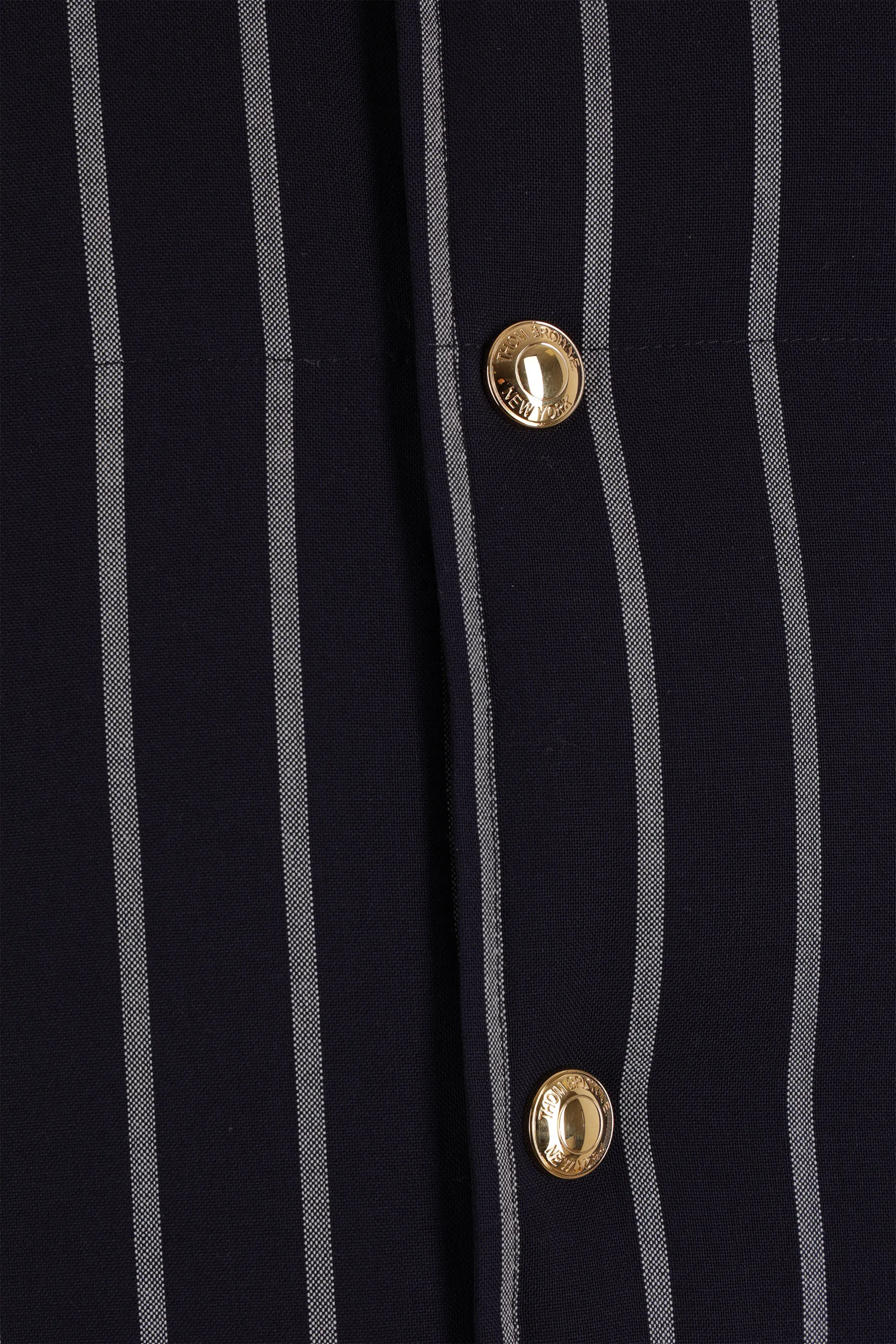 THOM BROWNE piumino smanicato in lana a righe